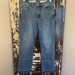 Women’s Pilcro and The Letterpress distressed High Rise Flare raw hem Jeans.